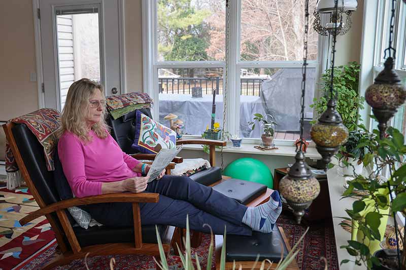 Homeowner relaxing in home