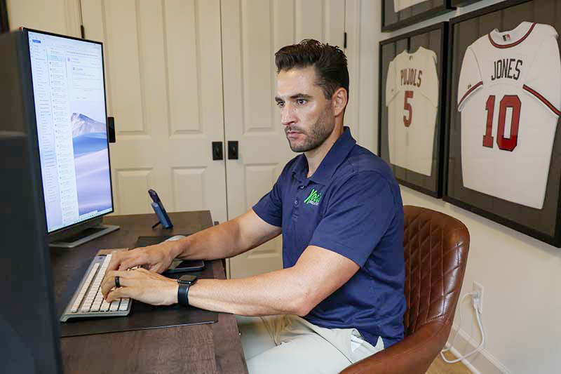 Man at computer.