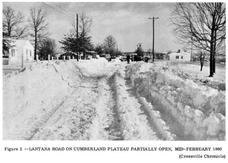 A black-and-white newspaper photo of a snowy road on the Cumberland Plateau in February 1960. 