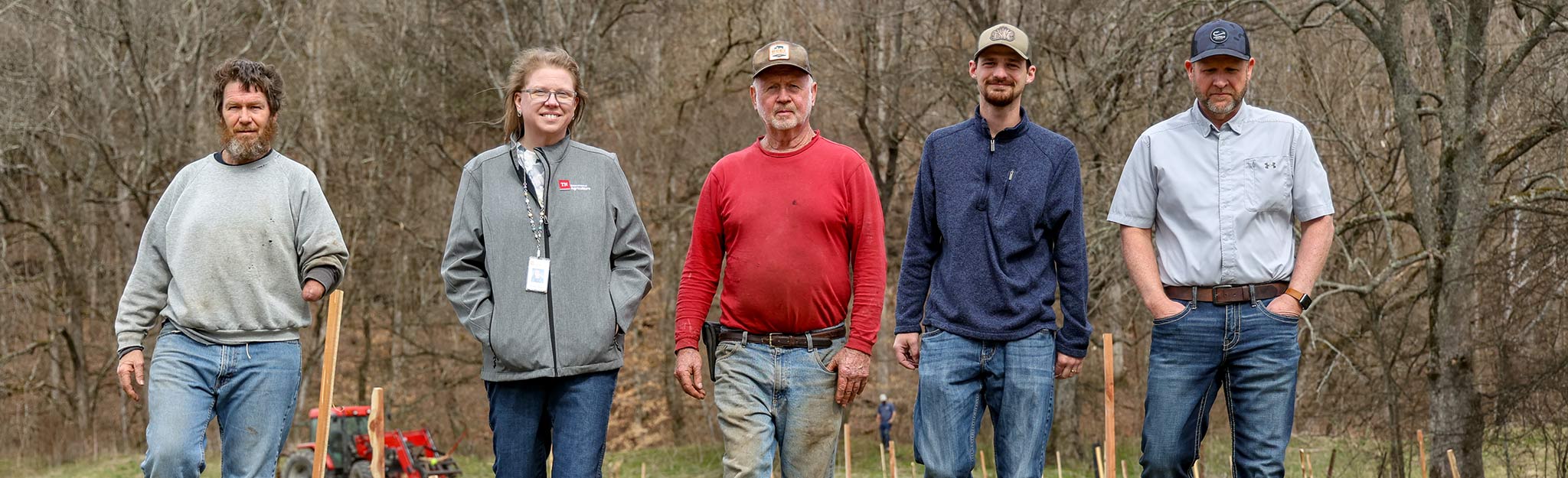 A-TRIP-45 Farmers and TVA partners walking in Tennessee field