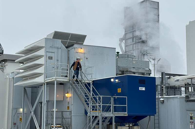 A TVA employee steps into the cold outside Brownsville Combustion Turbine Plant.