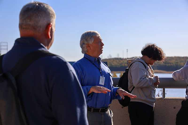 Volunteer speaks to students