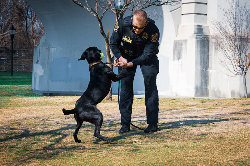 TVA Police Inspector Cleveland with K-9 Money in Coolidge Park in Chattanooga.