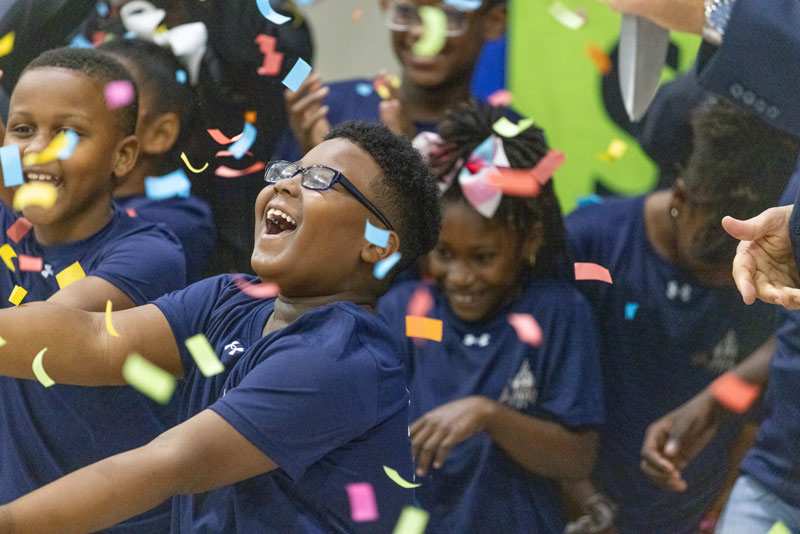 Children celebrate the grand opening of the new STEM center at the Boys & Girls Club of North Mississippi
