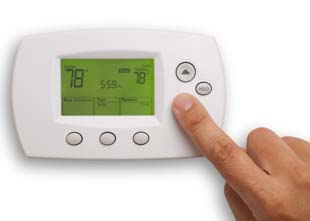 Digital Thermostat and male hand