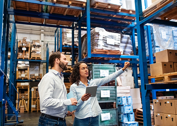 Two workers at warehouse