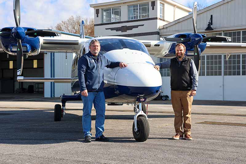 TVA aircraft maintenance supervisor Gordon Richey and TVA aerial data and operations training manager Walt Hodges with the new aircraft that will assist with surveying transmission lines across the region