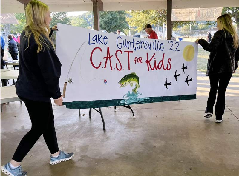 hand-painted sign advertising for the C.A.S.T 