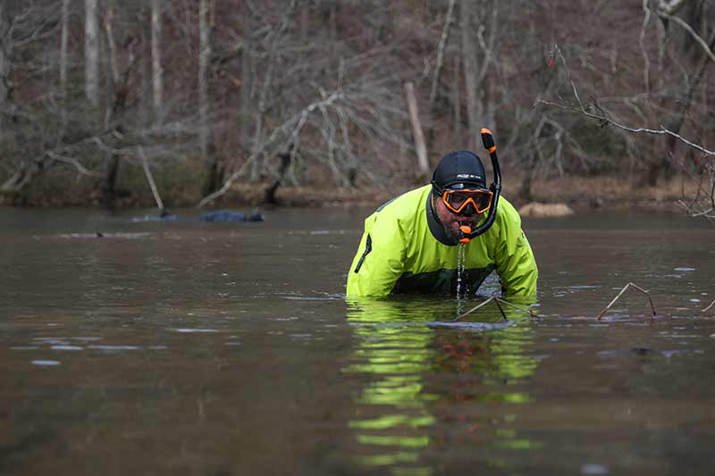 TWRA biologist Tim Lane partners with TVA as part of the Mussel Recovery Initiative.