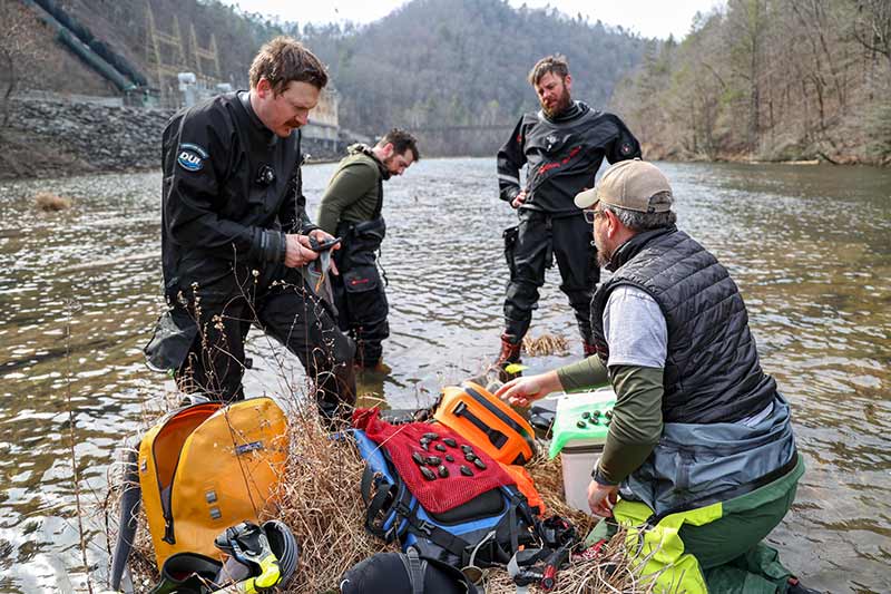 TVA and TWRA biologists look at mussels collected from Hiwassee River
