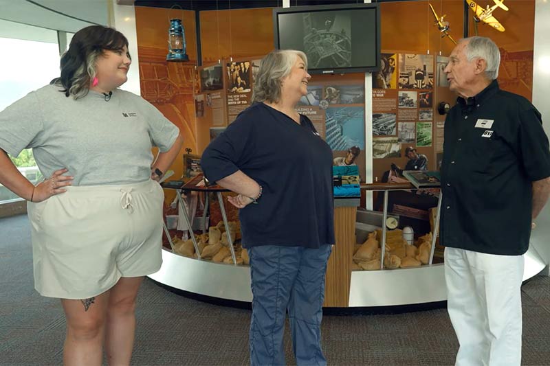 Ashley Walker and Pat Ezzell talk with volunteer at Fontana Dam visitor center