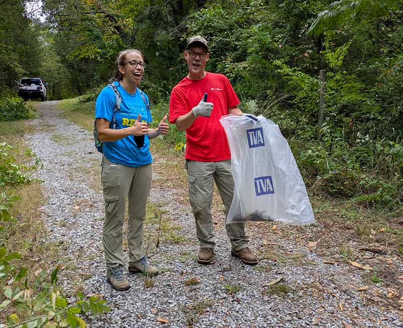 Volunteers pick up trash