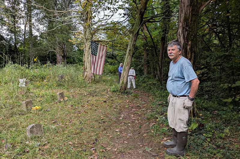 Volunteers work at Worthington Cemetery ecological area