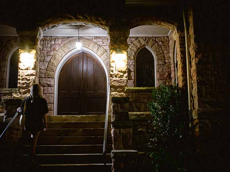 House of worship with lights on porch