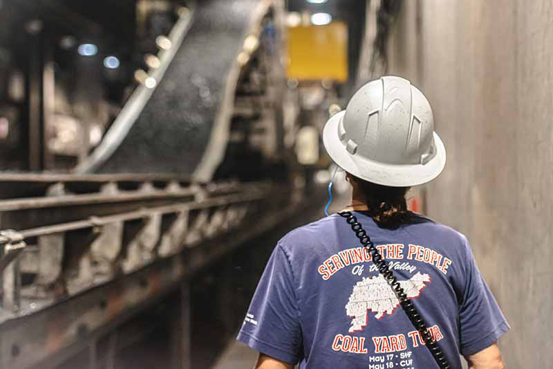 Kristy Collins, Gallatin Fossil Plant, wearing a shirt that says