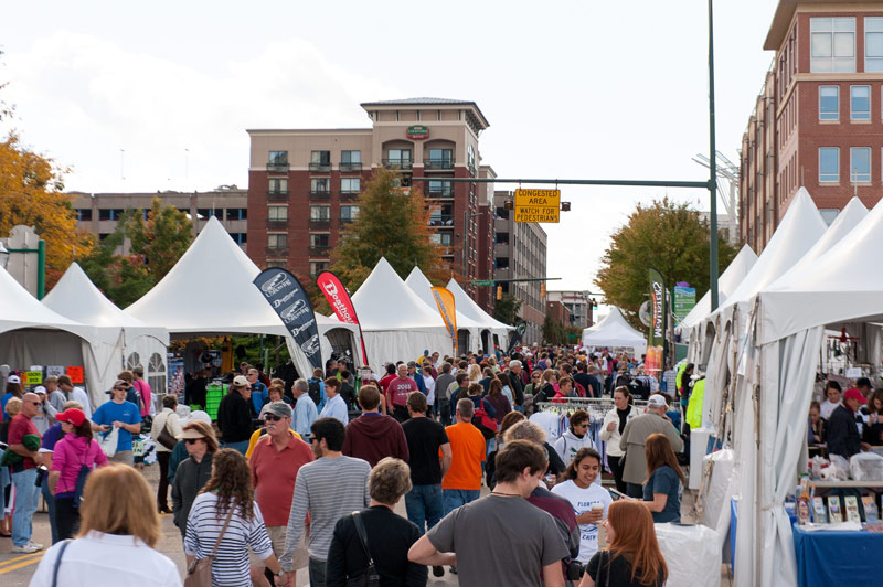 Throngs of people visit booths and vendors in downtown Chattanooga during the Head of the Hooch Regatta. 