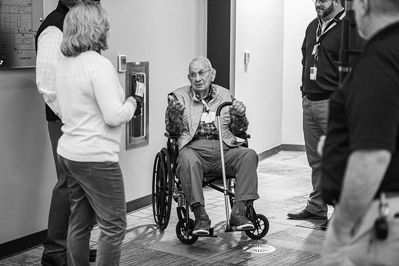 TVA retiree Hugh Gardner chats with people at the SOC