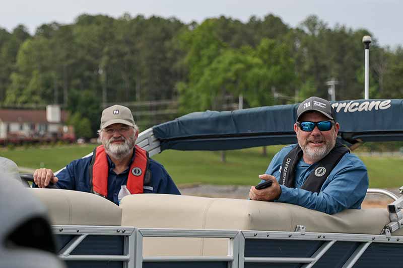 TVA's Kurt Lakin and Shannon O'Quinn on a support boat during the spring sport fish survey.