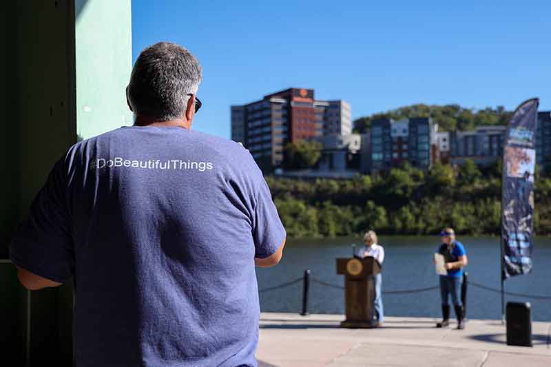 Man wearing T-shirt that says Do Beautiful Things