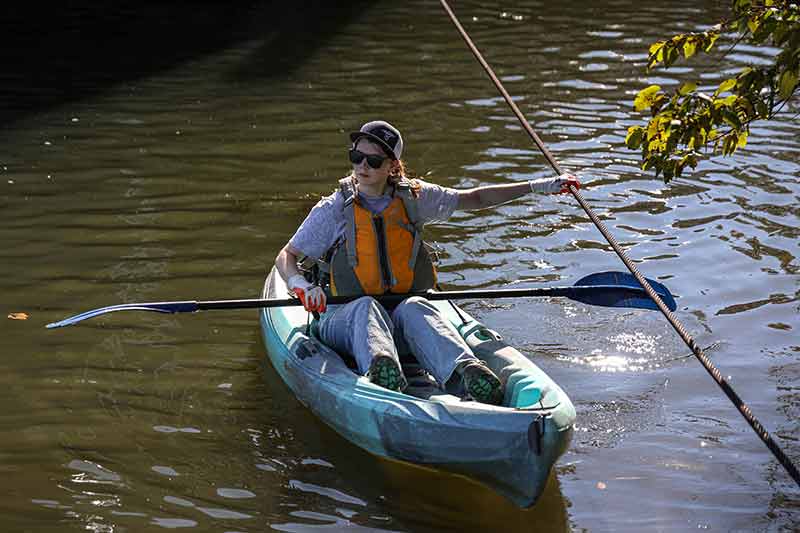 Volunteer Christy Hobby kayaks in downtown Knoxville