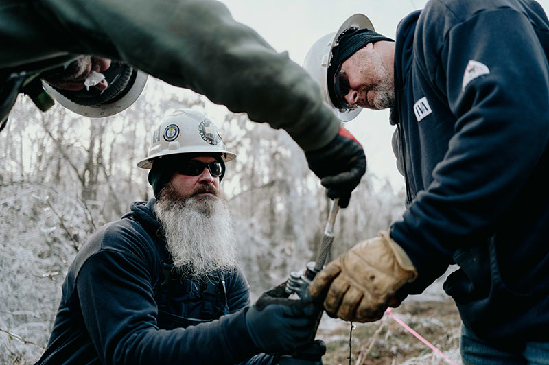 Transmission crews repair broken transmission lines during Winter Storm Fern