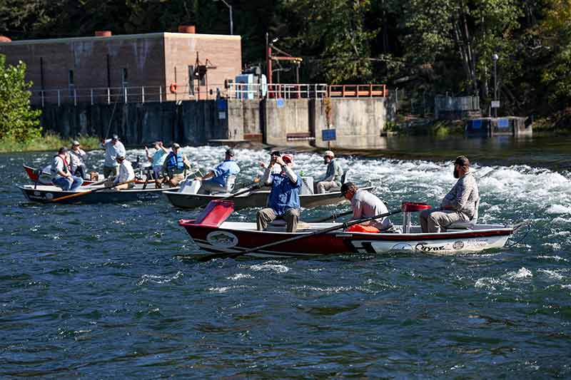 People fishing from boats.