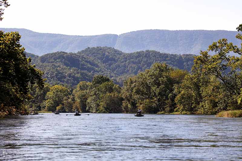 River with mountains in the background.