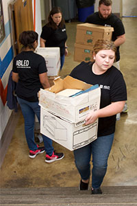  TVA employees assist with cleanup at the Orange Grove Center in Chattanooga