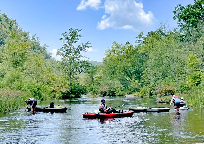 TVA specialists kayak along the Hiwassee River