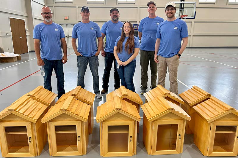 Week of Service volunteers build small libraries