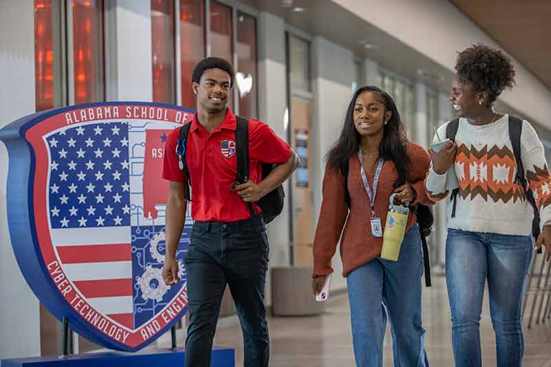 Alabama School of Cyber Technology and Engineering students walk to class
