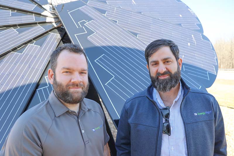 TVA energy efficiency experts Tyler Marlow and Chris Azar visit the Smartflowers 