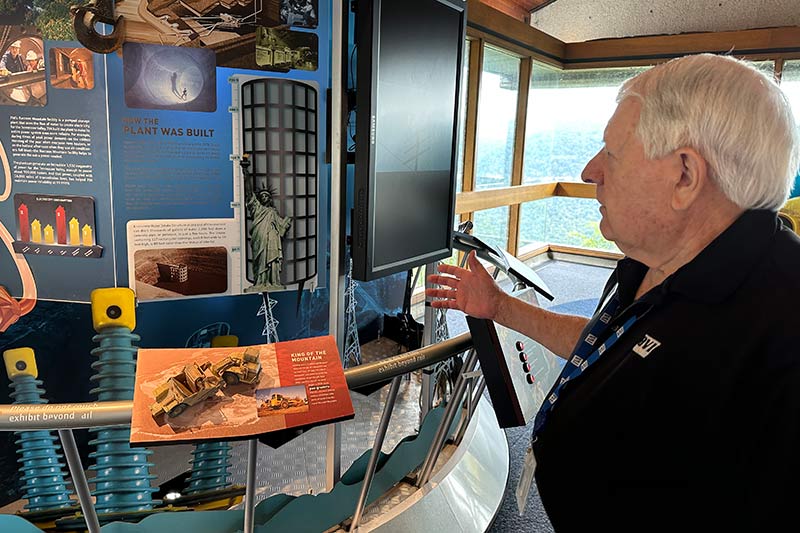 Volunteer Tony Giggy explains display at Raccoon Mountain Visitor Center
