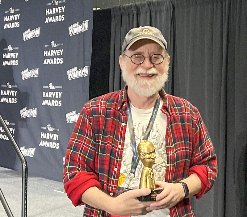 Walt Simonson receives the Harvey Kurtzman Award in 2023. 