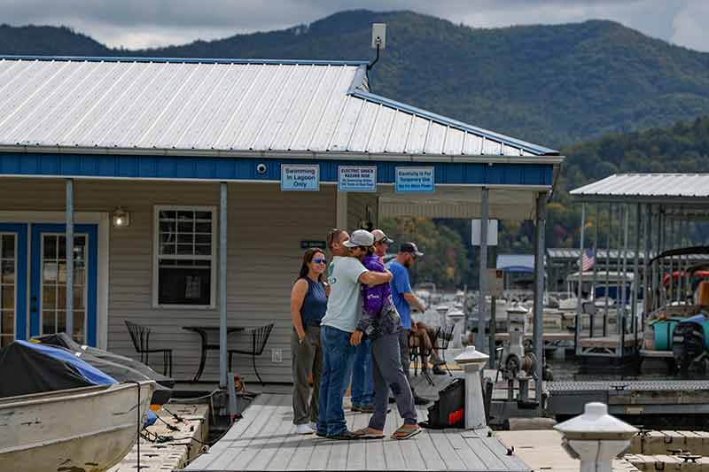 Tripp Berlinsky, from the University of North Alabama, gets a big hug from family members