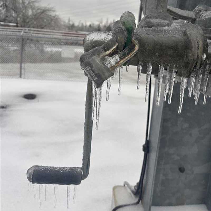 Winter Storm Fern coated electrical equipment in a thick layer of ice