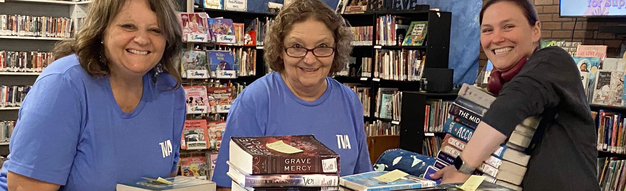 TVA 92nd anniversary Week of Service volunteers at library