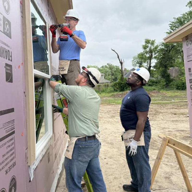 92nd anniversary Week of Service volunteers build home