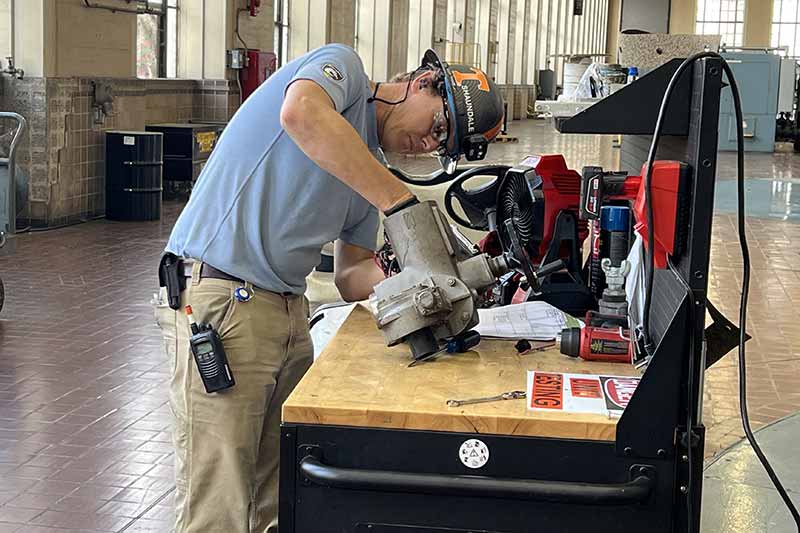 Machinist Shaundale Hanback working on a motor-operated valve