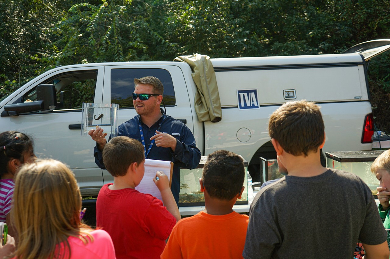 Mollish interacting with the students