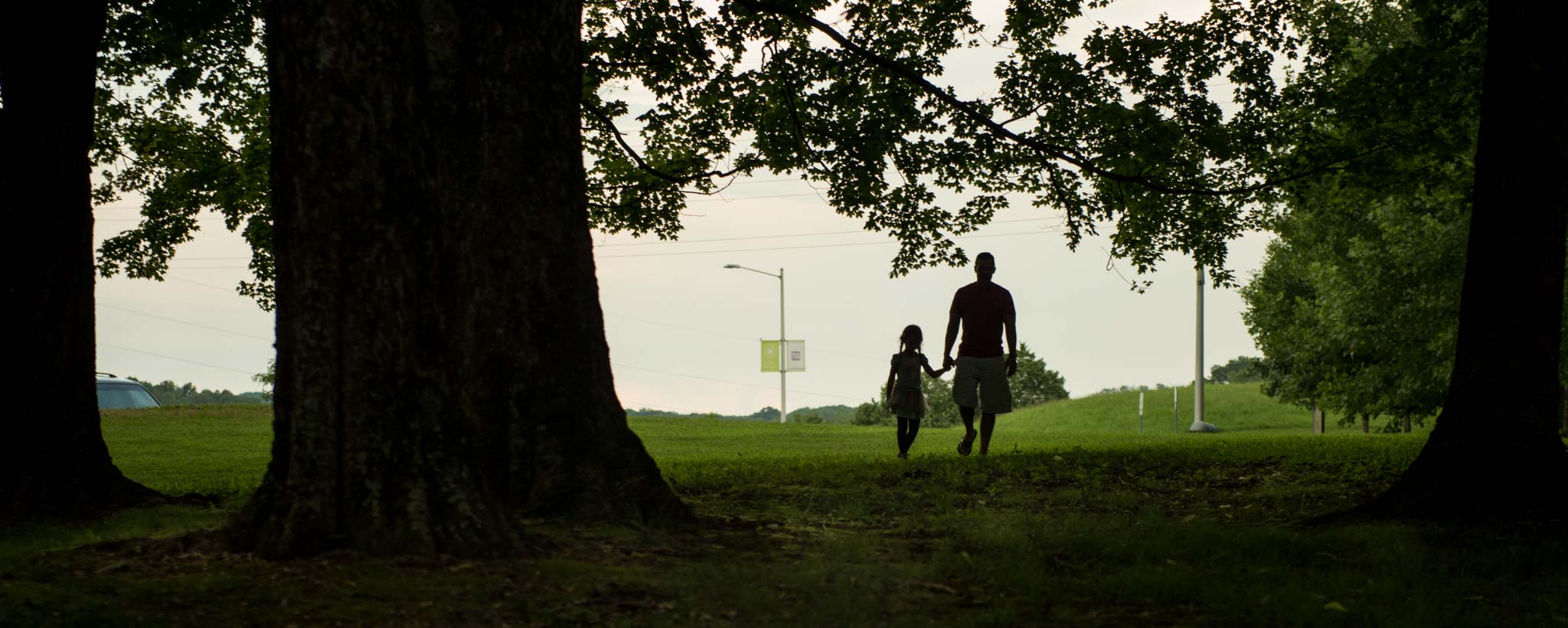 dad and daughter walking