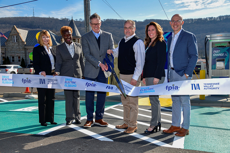 Fast Charger ribbon cutting