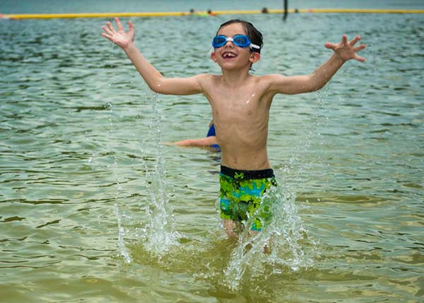 Boy Playing in Melton HIll Swim Beach