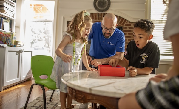 People playing a game on a table